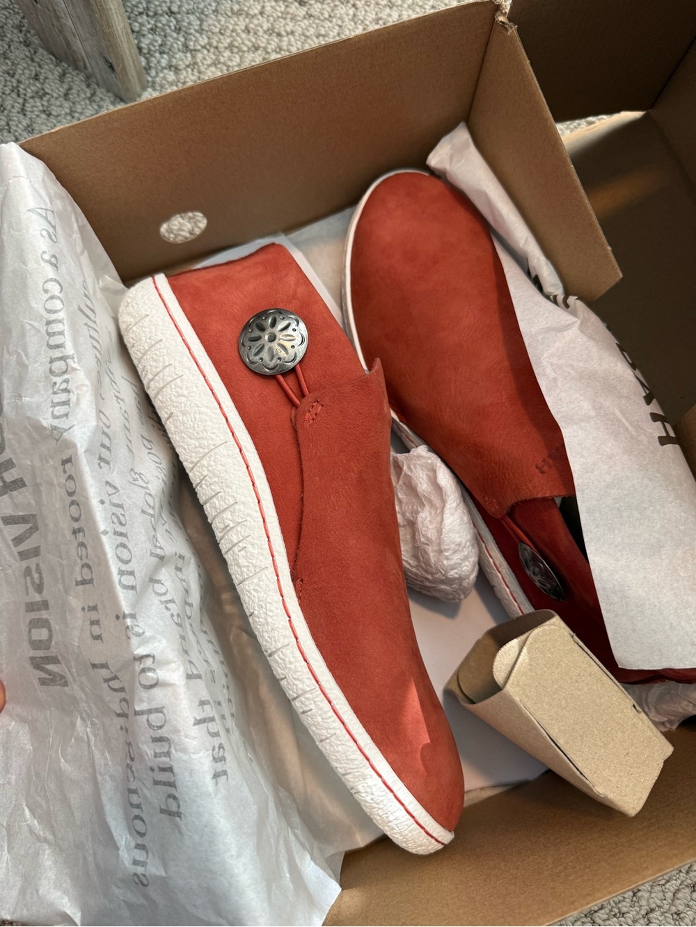 Women's Suede Slip-On Moccasins in Rust with Decorative Concho